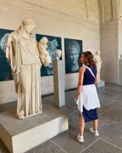 Woman in a museum in front of a sculpture in Munich, Germany